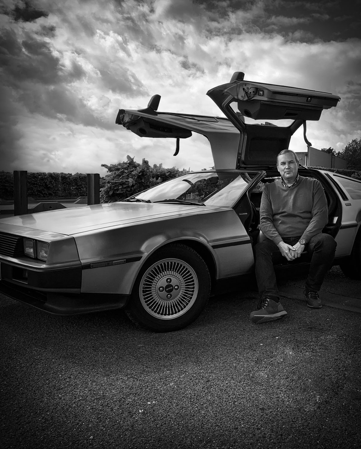 Artist Jan Indekeu with classic car DeLorean